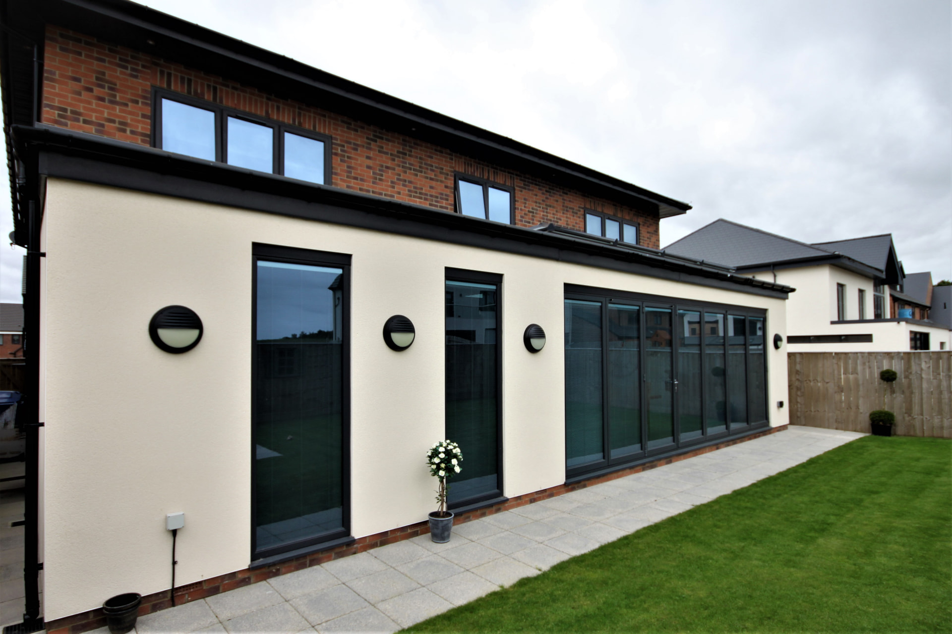 Aluminium sliding doors on a modern extension, supplied by WGS Glazing