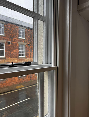 Secondary glazing fitted inside a period sash window, supplied by WGS Glazing